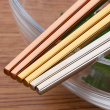 Load image into Gallery viewer, These Chinese chopsticks by Allthingscurated is contemporary with a square design for better food gripping. Made of 304 food grade stainless steel, they come in 6 different color combinations of Black and Gold, Black and Rose Gold, Black and Silver, White and Black, White and Gold, White and Rose Gold. Retailed as a set of 6 pairs, choose from one of the above color combinations or opt for an assorted set of 6 different color combinations. Chopstick length is 23.5cm or 9 inches.'
