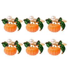 Load image into Gallery viewer, Faux Pearl Pumpkin Rings by Allthingscurated come in a set of 6 napkin rings. Each ring is crafted with exquisite detail of a pumpkin design and adorned with a faux pearl to bring a touch of sophistication. Perfect for all fall festivities, from Halloween to Thanksgiving. 
