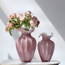 Load image into Gallery viewer, Anais Pink Beaded Vases by Allthingscurated are crafted from handblown glasses. Featuring a curvaceous body with an asymmetrical beaded rim that flares back like a collar.  Its captivating shape and romantic pink hue makes it a statement piece and a glamorous addition to your vase collection. Available in small and large size.
