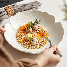 Load image into Gallery viewer, Audri Flower Serving Bowl by Allthingscurated featured a distinct flower design with petal edges and vivid texture surface in neutral white.  The low bowl design comes in 3 sizes.
