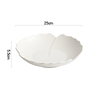 Audri Flower Serving Bowl by Allthingscurated featured a distinct flower design with petal edges and vivid texture surface in neutral white.  The low bowl design comes in 3 sizes.  Featured here is a medium size measuring 25cm or 9.8 inches in width and 5.5cm or 2 inches in height.