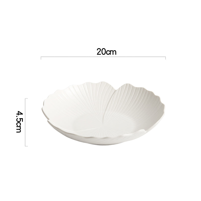 Audri Flower Serving Bowl by Allthingscurated featured a distinct flower design with petal edges and vivid texture surface in neutral white.  The low bowl design comes in 3 sizes.  Featured here is a small size measuring 20cm or 7.8 inches in width and 4.5cm or 1.8 inches in height.