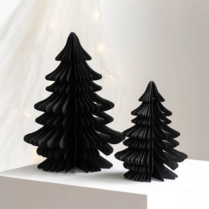 Honeycomb Christmas Trees by Allthingscurated featured a set of 2 sculptural trees expertly crafted with paper to bring a pretty and festive touch to your Yuletide decorations. These delightful paper decorations are simple to assemble and store away, making them reusable year after year. Comes in 2 styles and 4 color groupings of Red, Brown, White and Black. Each set consists of a small and large tree. Featured here is a set of Black Trees.