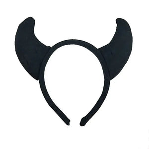 Horn Shape Headband by Allthingscurated features trendy, three-dimensional horns that is fun and perfect for elevating your Halloween party look. This accessory is perfect for adding a playful touch to your costume and make a statement at any Halloween party. Comes in 3 colors. Featured here is the Black headband.