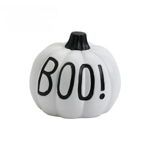 Halloween Pumpkin Tabletop Ornaments by Allthingscurated are the perfect additions to enhance the spooky ambience of your Halloween décor. Great for dressing up your dining table for a spooky gathering or simply pile them up on your mantels or tabletops as fun decorations for the season. Available in 4 different pumpkin designs. Featured here is white pumpkin design with boo wording.