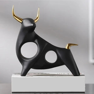 Brooklyn Bull Sculptures by Allthingscurated capture the elegance and dramatic aura of the auspicious animal in a sleek, modern design with matte black finish and gold-accented horns. A visually-appealing and timeless collection, it’s a fashionable piece to add to any contemporary home and spaces. And perfect as a gift for those with a Taurus horoscope or Chinese Ox zodiac sign. Featured here is the Fearless Bull Sculpture.