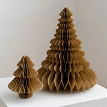 Load image into Gallery viewer, Honeycomb Christmas Trees by Allthingscurated featured a set of 2 sculptural trees expertly crafted with paper to bring a pretty and festive touch to your Yuletide decorations. These delightful paper decorations are simple to assemble and store away, making them reusable year after year. Comes in 2 styles and 4 color groupings of Red, Brown, White and Black. Each set consists of a small and large tree. Featured here is a set of Brown Trees.
