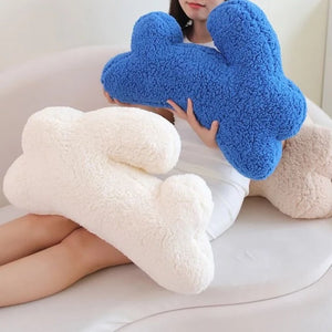 Cozy Teddy Bunny Pillow by Allthingscurated shaped like a cute bunny is sewn from soft, fluffy teddy fabric.  The hug pillow is cute, cuddly and oh-so-cozy. Its playful shape will bring a quirky charm to any room. Available in white, sand, red and blue.
