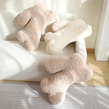 Load image into Gallery viewer, Cozy Teddy Bunny Pillow by Allthingscurated shaped like a cute bunny is sewn from soft, fluffy teddy fabric.  The hug pillow is cute, cuddly and oh-so-cozy. Its playful shape will bring a quirky charm to any room. Available in white, sand, red and blue.
