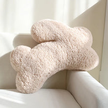Load image into Gallery viewer, Cozy Teddy Bunny Pillow by Allthingscurated shaped like a cute bunny is sewn from soft, fluffy teddy fabric.  The hug pillow is cute, cuddly and oh-so-cozy. Its playful shape will bring a quirky charm to any room. Available in white, sand, red and blue. Featured here is sand bunny pillow.
