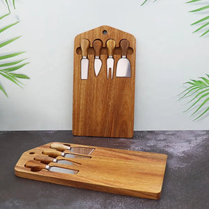 This 5-piece Magnetic Wood Cheese Board Set by Allthingscurated is crafted from Acacia wood and comes with 4 pieces of essential cheese tools. It’s a well-organized and cleverly-designed set featuring magnets on the board to hold all the tools securely for convenient storage. This set is the ultimate gift for house-warming and cheese lovers. Tools include a cheese fork, a flat cheese knife, a spade knife and a narrow plane knife.