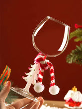 Load image into Gallery viewer, These charming Christmas Tree Stem Glass by Allthingscurated features a sculptural 3D design on the stem. Comes in classic green or bright white, it adds a festive vibe to your holiday gatherings. These glasses make thoughtful gifts for your loved ones.

