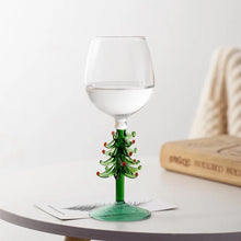 Load image into Gallery viewer, These charming Christmas Tree Stem Glass by Allthingscurated features a sculptural 3D design on the stem. Comes in classic green or bright white, it adds a festive vibe to your holiday gatherings. These glasses make thoughtful gifts for your loved ones.
