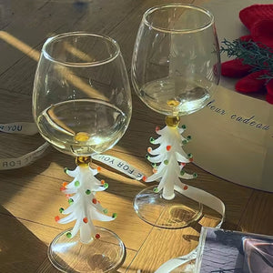 These charming Christmas Tree Stem Glass by Allthingscurated features a sculptural 3D design on the stem. Comes in classic green or bright white, it adds a festive vibe to your holiday gatherings. These glasses make thoughtful gifts for your loved ones.