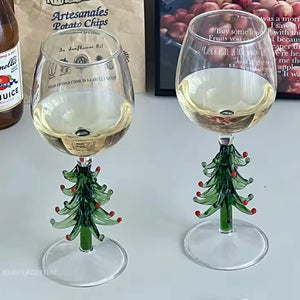 These charming Christmas Tree Stem Glass by Allthingscurated features a sculptural 3D design on the stem. Comes in classic green or bright white, it adds a festive vibe to your holiday gatherings. These glasses make thoughtful gifts for your loved ones.