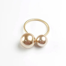 Load image into Gallery viewer, Faux Pearls Napkin Rings in a set of 6 by Allthingscurated are adorned with big and small pearls to create an overall look of elegance and sophistication.  They are perfect for special occasions. Come available in 4 different color combinations. Featured here is Champagne Gold Set

