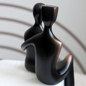 These pair of Abstract Couple Figurines has a modern and sleek design featuring a loving couple in embrace. It adds a touch of modern elegance to your space and looks sophisticated in their gradient black and bronze colors. Makes for a beautiful table tabletop decoration and perfect as a wedding or Valentine’s Day gift.