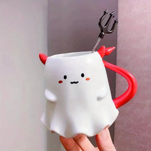 Load image into Gallery viewer, Cute Devil Mug by Allthingscurated features a devil design complete with red horns and tail, and even comes with a stirrer designed as a trident. Perfect for your personal cup or as a gift for friends and colleagues during Halloween season.
