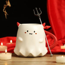 Load image into Gallery viewer, Cute Devil Mug by Allthingscurated features a devil design complete with red horns and tail, and even comes with a stirrer designed as a trident. Perfect for your personal cup or as a gift for friends and colleagues during Halloween season.
