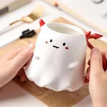 Load image into Gallery viewer, Cute Devil Mug by Allthingscurated features a devil design complete with red horns and tail, and even comes with a stirrer designed as a trident. Perfect for your personal cup or as a gift for friends and colleagues during Halloween season.
