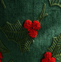 Load image into Gallery viewer, Dark green fabric embroidered with holly leaves and red berries for Christmas decor.
