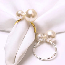 Load image into Gallery viewer, Faux Pearls Napkin Rings in a set of 6 by Allthingscurated are adorned with big and small pearls to create an overall look of elegance and sophistication.  They are perfect for special occasions. Come available in 4 different color combinations.
