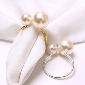 Faux Pearls Napkin Rings in a set of 6 by Allthingscurated are adorned with big and small pearls to create an overall look of elegance and sophistication.  They are perfect for special occasions. Come available in 4 different color combinations.
