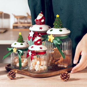 Christmas Festive Storage Jars by Allthingscurated are the perfect jars to keep all your festive treats fresh and delicious. The jars are airtight and each jar is topped with a ceramic lid decorated with a Santa Claus, Christmas Tree, Penguin, Gnome or Fox. Comes in 2 sizes with capacity of 300ml or 10 ounce and 1000ml or 34 ounce.