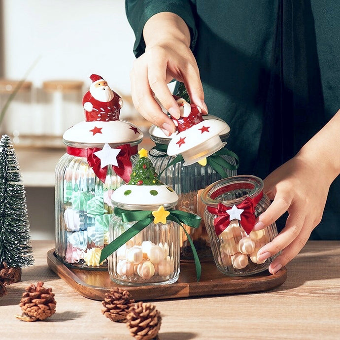 Christmas Festive Storage Jars by Allthingscurated are the perfect jars to keep all your festive treats fresh and delicious. The jars are airtight and each jar is topped with a ceramic lid decorated with a Santa Claus, Christmas Tree, Penguin, Gnome or Fox. Comes in 2 sizes with capacity of 300ml or 10 ounce and 1000ml or 34 ounce.