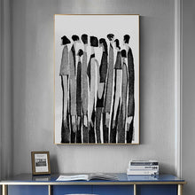 Load image into Gallery viewer, Modern Abstract Figure Art Canvas Print by Allthingscurated featured abstract human silhouettes in black and white is well suited for a contemporary and modern home with a minimalist vibe.
