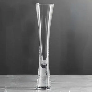 Combining style and functionality, Fion Champagne Flutes by Allthingscurated are hand-crafted from 100% lead-free crystal glass. These elegant flutes boast a sleek, modern, minimalistic design with a weighty base to provide stability and helps to maintain the temperature of your champagne. Comes in a set of 2 or 4 glasses. They are perfect for special occasion and make a stunning wedding gift.