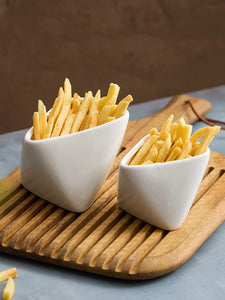 Porcelain French Fries Snack Bowl by Allthingscurated is inspired by the classic design of the French fries food packaging. Perfect for serving fries, the stylish and functional bowl makes your French fries look top-notch when dining at home with steak frites; and add a touch of flair to your casual meals. Come in 2 sizes.