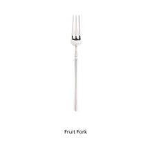 Load image into Gallery viewer, Bright Silver Stainless Steel flatware by Allthingscurated crafted from high-quality stainless steel with a forged construction ensures durability.  It has a bright silver mirror finish that will add a touch of elegance to any meal.  This is a Fruit Fork.
