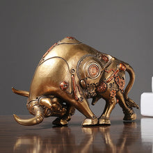 Load image into Gallery viewer, Futurox bull sculpture by Allthingscurated is the embodiment of steampunk aesthetics and futuristic mechanics. This exquisite masterpiece combines the grace and strength of a bull with the intricate beauty of gears. Standing at a height of 13.5cm or 5.3 inches, with length of 22.5cm or 8.8 inches and depth of 10.5cm or 4.1 inches. Its captivating presence will effortlessly elevate any space. Comes in gold and silver.
