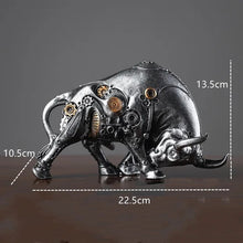 Load image into Gallery viewer, Futurox bull sculpture by Allthingscurated is the embodiment of steampunk aesthetics and futuristic mechanics. This exquisite masterpiece combines the grace and strength of a bull with the intricate beauty of gears. Standing at a height of 13.5cm or 5.3 inches, with length of 22.5cm or 8.8 inches and depth of 10.5cm or 4.1 inches. Its captivating presence will effortlessly elevate any space. Comes in gold and silver. Featured here is the sculpture in Silver.
