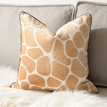 Load image into Gallery viewer, Glamorous Animal Prints Cushion Covers by Allthingscurated featured 6 animal print designs in tiger stripes, cheetah spots, zebra stripes and giraffe print. In a neutral palette and warm texture that work well with a variety of decorating styles. Timeless and chic, they are the perfect accessories to dress up with home with a wow factor. Comes in 2 square sizes of 45 by 45cm or 17.5 by 17.5 inches or 50 by 50cm or 19.5 by 19.5 inches. Featured here is the giraffe print.

