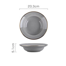 Load image into Gallery viewer, Kovan Ceramic Pasta/Soup Bowl by Allthingscurated is a stylish and functional bowl that offers versatility and practicality in usage. Perfectly sized for pasta, soups, stews, desserts and more. It’s a must-have addition to your dinnerware collection for all occasions from formal dining to everyday casual meals. Featured here is our Kovan  Pasta Bowl in gray with gold rim.
