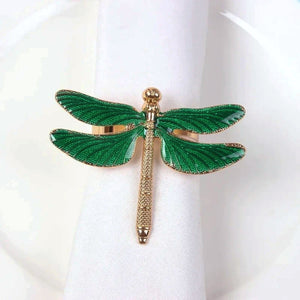 Dragonfly Napkin Rings by Allthingscurated come as a set of 6 rings in either classic gold or perennial green design. These dragon-shaped rings featured vivid venation patterns on their wings, adding a touch of natural beauty to any botanical-themed setting. Perfect for elevating your Summer tablescape. Featured here is the green design.