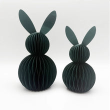 Load image into Gallery viewer, This curated set of two Honeycomb Easter Bunnies by Allthingscurated instantly transforms any space into a festive Easter wonderland. Their adorable silhouettes add personality and warmth to your holiday décor. Quick assembly and compact storage, with proper care, they remain beautiful year after year. Comes in 5 delightful colors. See here is a set of two dark green bunnies on a white background.
