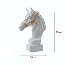 Load image into Gallery viewer, White horse head sculpture in white background with measurements. Fargo Horse Head Bust by Allthingscurated is an elegant decorative sculpture with meticulous detail and flaunts a gorgeous gold-accented bridle. Perfect for horse enthusiasts and makes a meaningful gift for those born under the Horse zodiac sign. And expertly crafted to complement both timeless classic and contemporary modern interiors.
