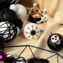 Load image into Gallery viewer, Halloween Decorative Bauble Set by Allthingscurated comes in a box containing 16 hand-painted ball ornaments featuring unique designs such as skulls, black cats, witches on broomsticks, white ghosts and creepy eyeballs. These decorated ornaments are perfect for adding an eclectic and quirky touch to your tree or home.
