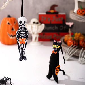Halloween-themed cat toy with skeleton design in front of a festive background. These adorable Halloween Decorative Hangings Dolls by Allthingscurated spark joy and give your Holiday decor a fun and eerie vibe.