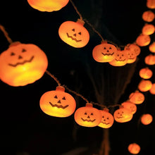 Load image into Gallery viewer, Halloween Pumpkin LED String Lights by Allthingscurated instantly illuminate your home with a warm, inviting glow. With easy installation, these lights instantly update your home décor and effortlessly add a spooky touch to your space.
