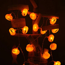 Load image into Gallery viewer, Halloween Pumpkin LED String Lights by Allthingscurated instantly illuminate your home with a warm, inviting glow. With easy installation, these lights instantly update your home décor and effortlessly add a spooky touch to your space.
