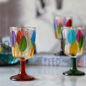 Havana Embossed Leaves Vintage Goblets by Allthingscurated, featuring contrasting multi-colored leaves embossed onto lead-free glass vessel. Charming with a touch of vintage vibe.