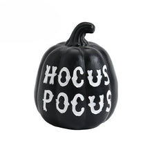 Load image into Gallery viewer, Halloween Pumpkin Tabletop Ornaments by Allthingscurated are the perfect additions to enhance the spooky ambience of your Halloween décor. Great for dressing up your dining table for a spooky gathering or simply pile them up on your mantels or tabletops as fun decorations for the season. Available in 4 different pumpkin designs. Featured here is black pumpkin design with hocus pocus wordings.
