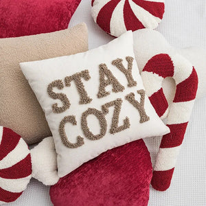 Holiday Pillows and Covers collection by Allthingscurated comes in an array of decorative pillows and covers in festive colors of red, white, beige and fun shapes. These include pillows in the shape of a heart, candy cane and peppermint. Sewn of luxurious fabric with a soft touch and in tufted playful designs. Pillows are available in varying sizes according to design and square pillow covers measure 45 by 45cm or 17.6 by 17.6 inches.