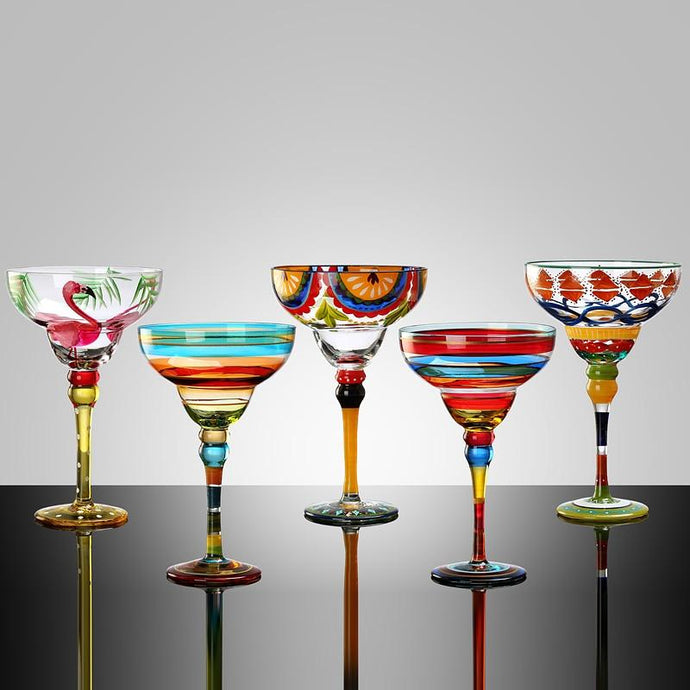 Ibiza Party Cocktail Glasses by Allthingscurated are available in 7 eclectic designs. Each cup is hand-painted and hand drawn to reflect its individual personality and creativity.  Each cup has a capacity of 270ml or 9 ounce.