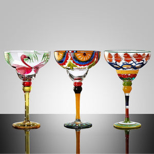 Ibiza Party Cocktail Glasses by Allthingscurated are available in 7 eclectic designs. Each cup is hand-painted and hand drawn to reflect its individual personality and creativity. Each cup has a capacity of 270ml or 9 ounce.