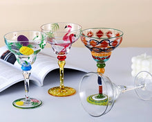 Load image into Gallery viewer, Ibiza Party Cocktail Glasses by Allthingscurated are available in 7 eclectic designs. Each cup is hand-painted and hand drawn to reflect its individual personality and creativity. Each cup has a capacity of 270ml or 9 ounce.
